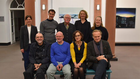 Gruppenbild in einem Ausstellungsraum